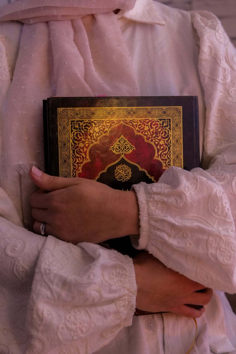 Woman Hugging the Quran